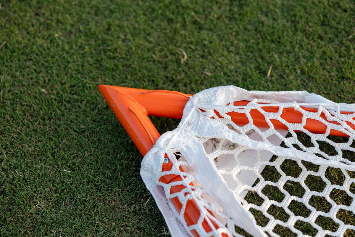 Crankshooter® Stinger Hexagon Lacrosse Net, 6mm or 7mm, 6'x6'x7', White or Black, USA Lacrosse/NCAA Approved, Double Lifespan, Includes 120 ft Lacing Cord & Bungees