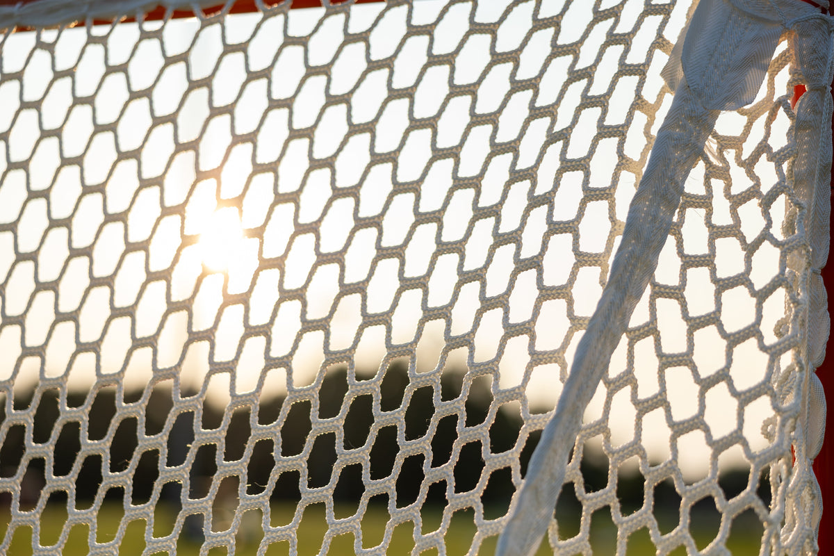 Crankshooter® Stinger Hexagon Lacrosse Net, 6mm or 7mm, 6'x6'x7', White or Black, USA Lacrosse/NCAA Approved, Double Lifespan, Includes 120 ft Lacing Cord & Bungees