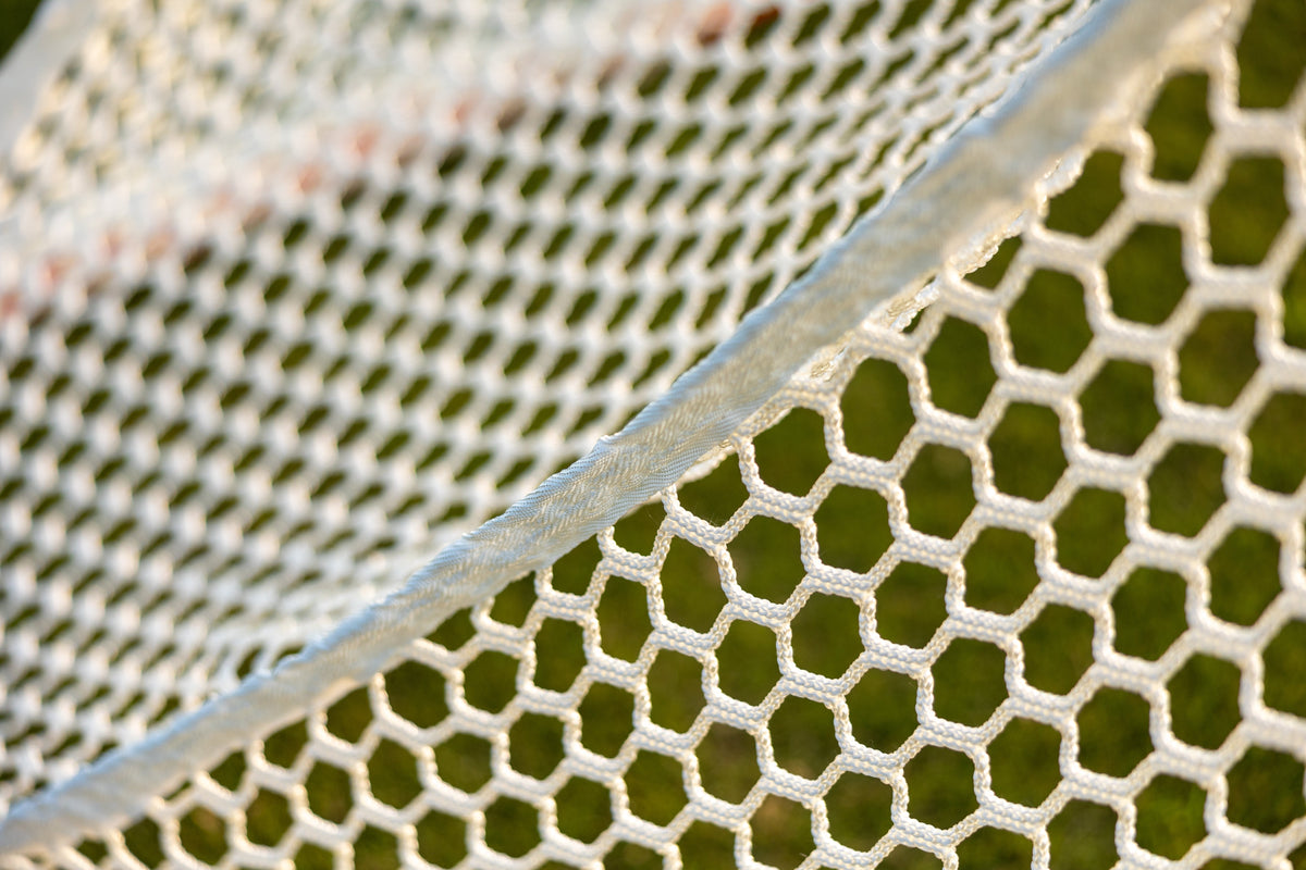 Crankshooter® Stinger Hexagon Lacrosse Net, 6mm or 7mm, 6'x6'x7', White or Black, USA Lacrosse/NCAA Approved, Double Lifespan, Includes 120 ft Lacing Cord & Bungees
